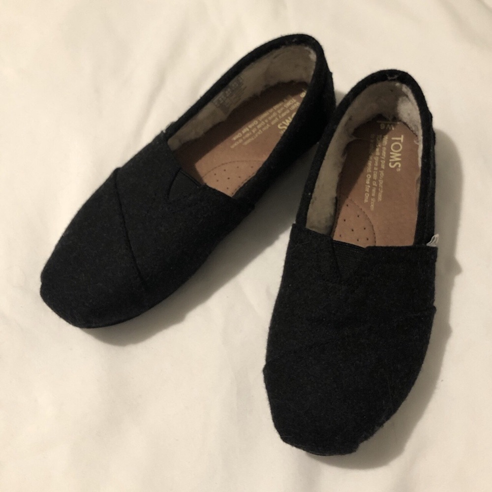 TOMS fuzzy slip ons